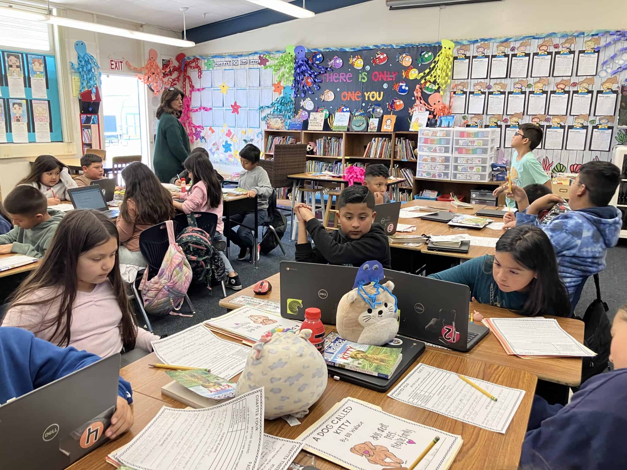 Students read and write at Frank Sparkes Elementary in Winton School District in Madera County